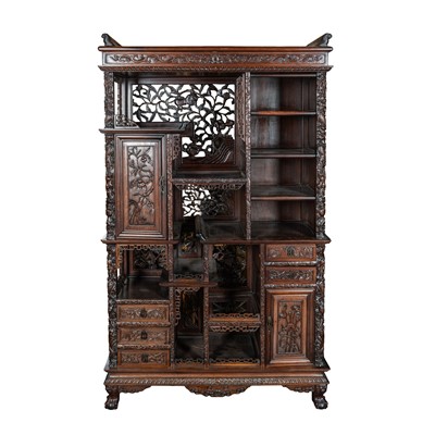 Lot 153 - A Chinese export carved and pierced hardwood cabinet, late 19th century