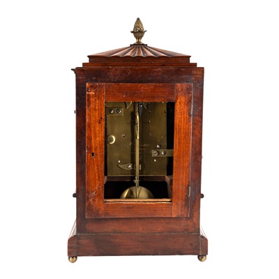 Lot 106 - A Regency brass inlaid mahogany mantel clock by Henry Banister of Fleet St., London