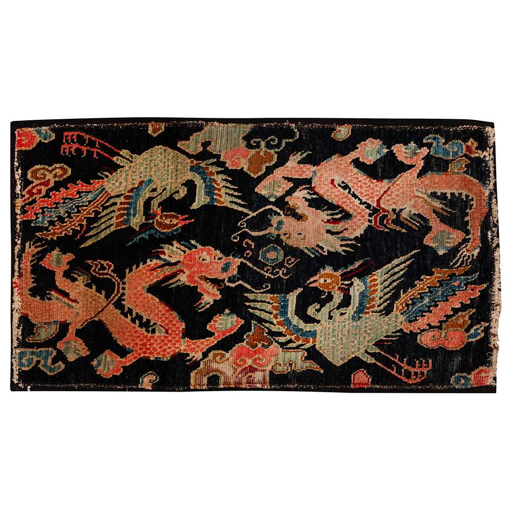 Lot 25 - An antique Tibetan rug