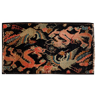 Lot 25 - An antique Tibetan rug