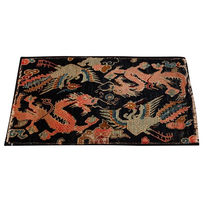 Lot 25 - An antique Tibetan rug