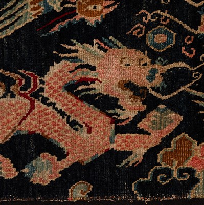Lot 25 - An antique Tibetan rug