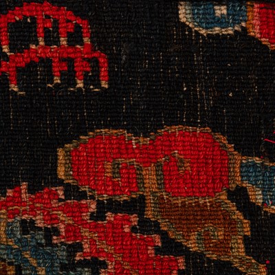 Lot 25 - An antique Tibetan rug