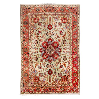 Lot 38 - A fine signed Tabriz carpet, north-west Persia