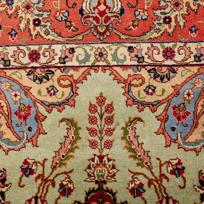 Lot 38 - A fine signed Tabriz carpet, north-west Persia