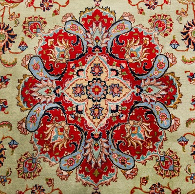 Lot 38 - A fine signed Tabriz carpet, north-west Persia