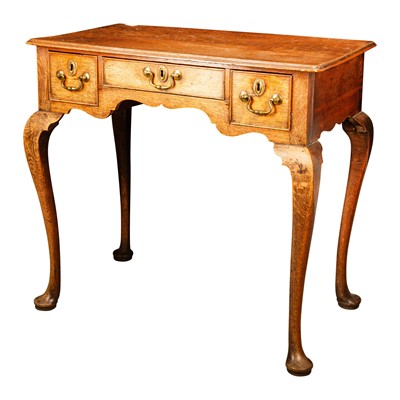Lot 35 - A George III oak low boy