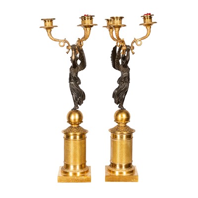 Lot 68 - Pair of French Empire bronze and ormolu candelabra