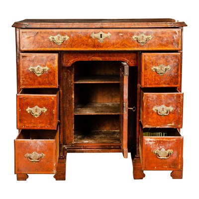 Lot 31 - A George II burr walnut and oak crossbanded kneehole desk