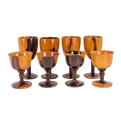 Lot 474 - Treen - a group of eight lignum vitae goblets