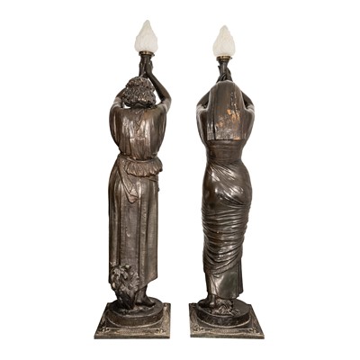 Lot 83 - A pair of French cast-iron figural torchères, after models by Mathurin Moreau (French, 1822-1912), early 20th century
