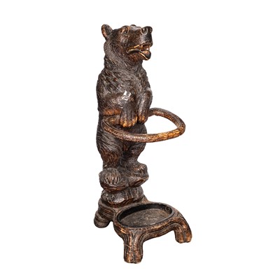 Lot 163 - A Swiss Black Forest carved linden wood bear stick stand, circa 1900