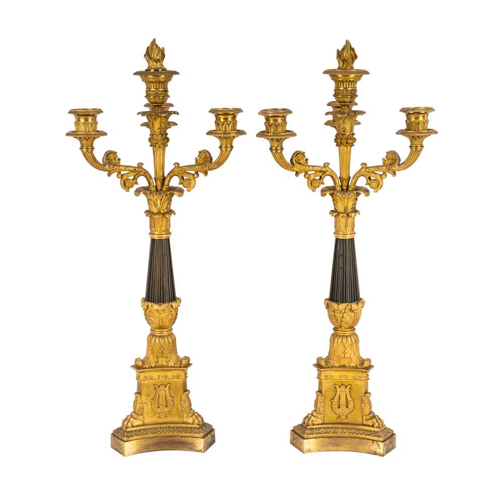 Lot 67 - A pair of Napoleon III period bronze and parcel gilt candelabra, circa 1860