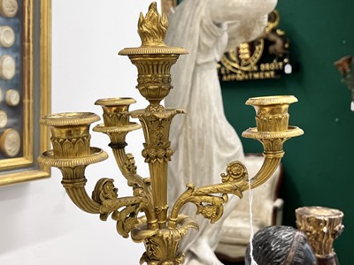 Lot 67 - A pair of Napoleon III period bronze and parcel gilt candelabra, circa 1860