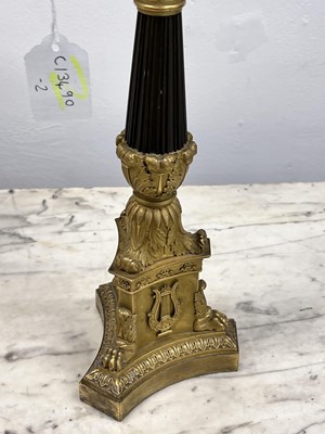 Lot 67 - A pair of Napoleon III period bronze and parcel gilt candelabra, circa 1860