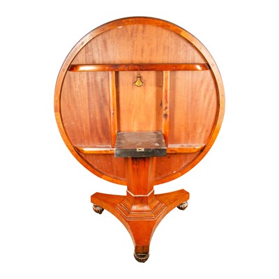 Lot 11 - A Regency rosewood circular dining table