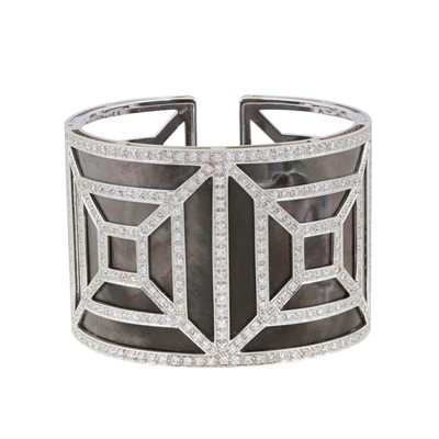 Lot 365 - Kutchinsky Ι A mother of pearl and diamond cuff bangle