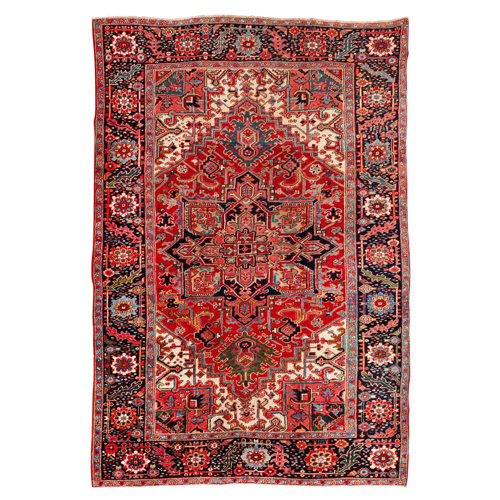 Lot 30 - An antique Heriz carpet, north-west Persia