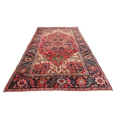 Lot 30 - An antique Heriz carpet, north-west Persia