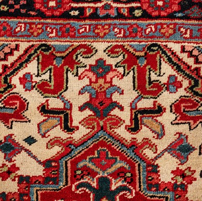 Lot 30 - An antique Heriz carpet, north-west Persia