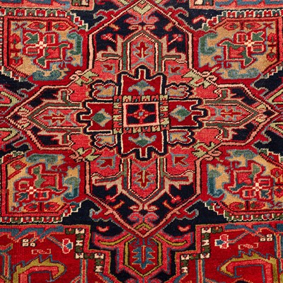 Lot 30 - An antique Heriz carpet, north-west Persia