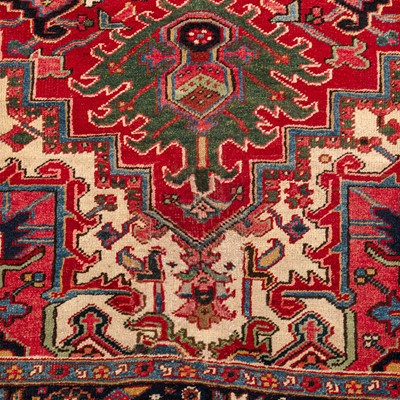 Lot 30 - An antique Heriz carpet, north-west Persia