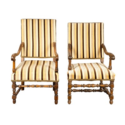 Lot 6 - A near pair of Louis XIII style walnut open armchairs