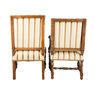 Lot 6 - A near pair of Louis XIII style walnut open armchairs