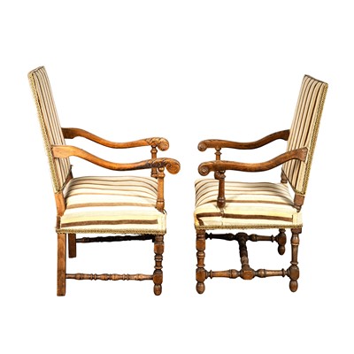 Lot 6 - A near pair of Louis XIII style walnut open armchairs