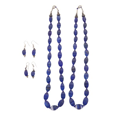 Lot 304 - Two lapis lazuli necklaces and earrings suites