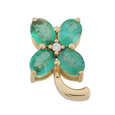 Lot 72 - An emerald and diamond flower pendant