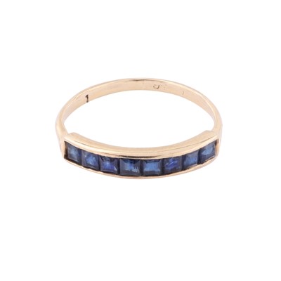 Lot 7 - A sapphire half eternity ring