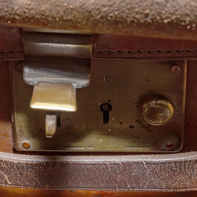 Lot 94 - A Finnigans of 18 New Bond Street brown leather travel trunk