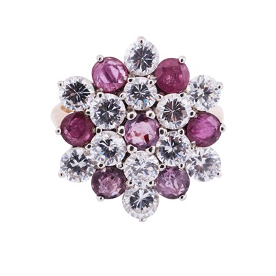 Lot 46 - A ruby and diamond imitation cluster ring, circa 1994