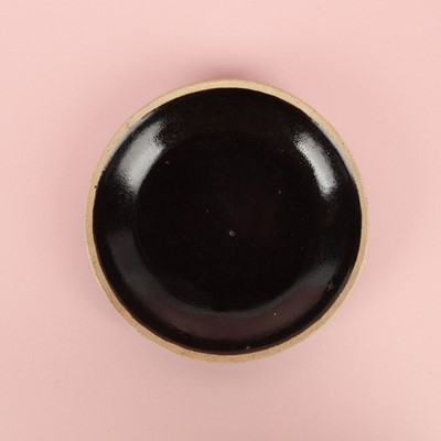 Lot 19 - A Chinese Henan black-glazed washer, Song dynasty
