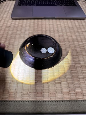 Lot 19 - A Chinese Henan black-glazed washer, Song dynasty