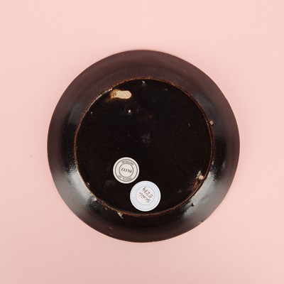 Lot 19 - A Chinese Henan black-glazed washer, Song dynasty