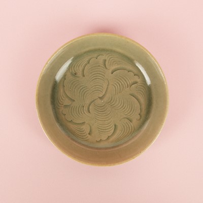 Lot 37 - A fine Chinese Yaozhou celadon 'waves' carved dish, Northern Song dynasty