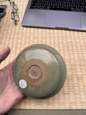 Lot 37 - A fine Chinese Yaozhou celadon 'waves' carved dish, Northern Song dynasty