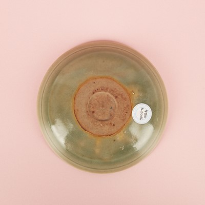 Lot 37 - A fine Chinese Yaozhou celadon 'waves' carved dish, Northern Song dynasty