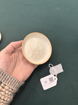 Lot 470 - A fine pair of small Chinese Qingbai 'floral' carved dishes, Southern Song dynasty