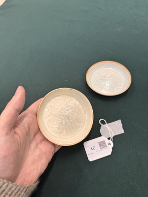 Lot 470 - A fine pair of small Chinese Qingbai 'floral' carved dishes, Southern Song dynasty