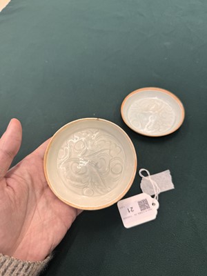 Lot 470 - A fine pair of small Chinese Qingbai 'floral' carved dishes, Southern Song dynasty