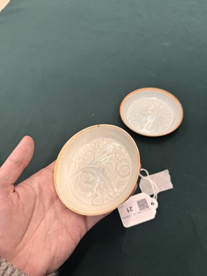 Lot 470 - A fine pair of small Chinese Qingbai 'floral' carved dishes, Southern Song dynasty