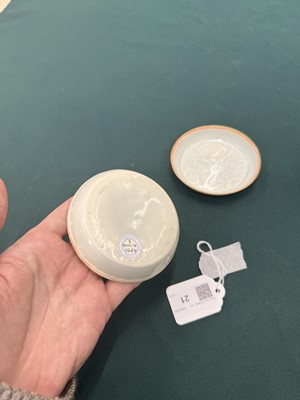 Lot 470 - A fine pair of small Chinese Qingbai 'floral' carved dishes, Southern Song dynasty