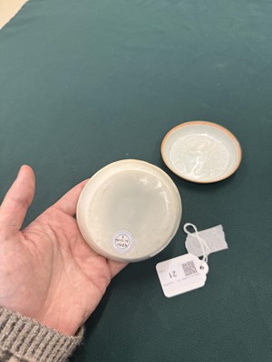 Lot 470 - A fine pair of small Chinese Qingbai 'floral' carved dishes, Southern Song dynasty