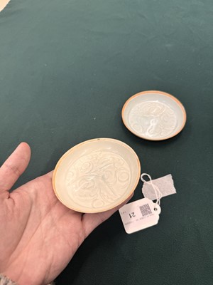 Lot 470 - A fine pair of small Chinese Qingbai 'floral' carved dishes, Southern Song dynasty