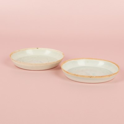Lot 470 - A fine pair of small Chinese Qingbai 'floral' carved dishes, Southern Song dynasty