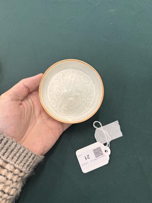 Lot 470 - A fine pair of small Chinese Qingbai 'floral' carved dishes, Southern Song dynasty
