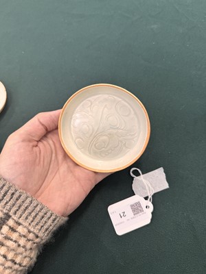 Lot 470 - A fine pair of small Chinese Qingbai 'floral' carved dishes, Southern Song dynasty